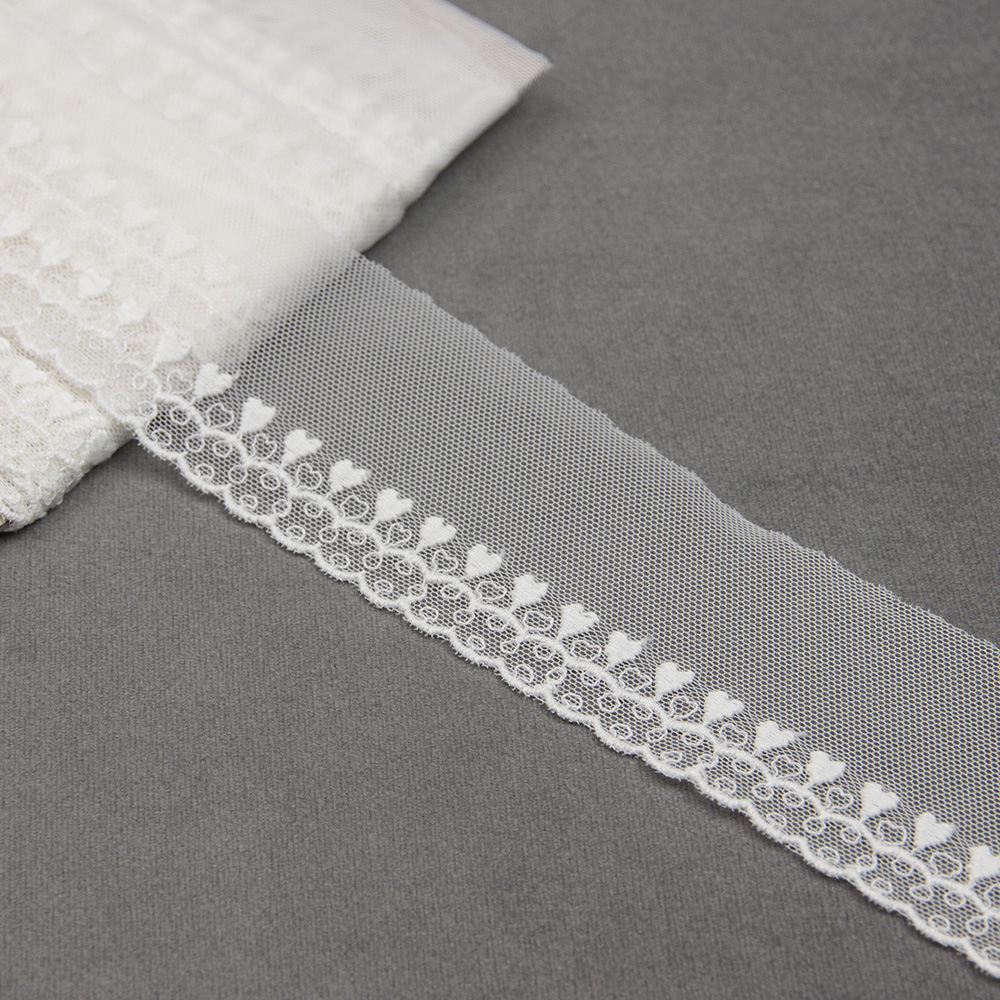 Тесьма на сетке 1675-7 молочный шир.5см